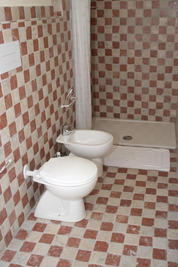 Guest House Le Gemelle Luras Extérieur photo